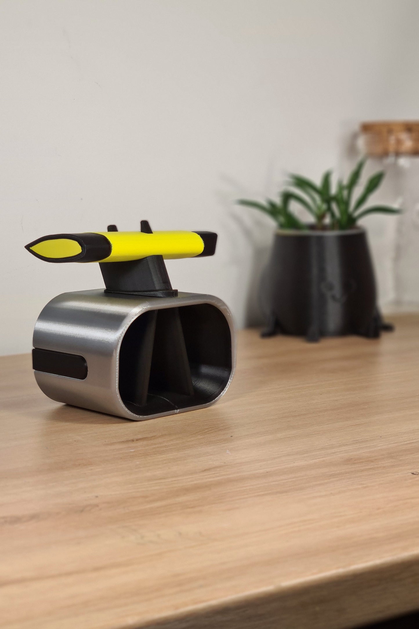 F1 Pirelli yellow soft tire pen and sleek silver desktop organizer set, unique motorsport fan gift.