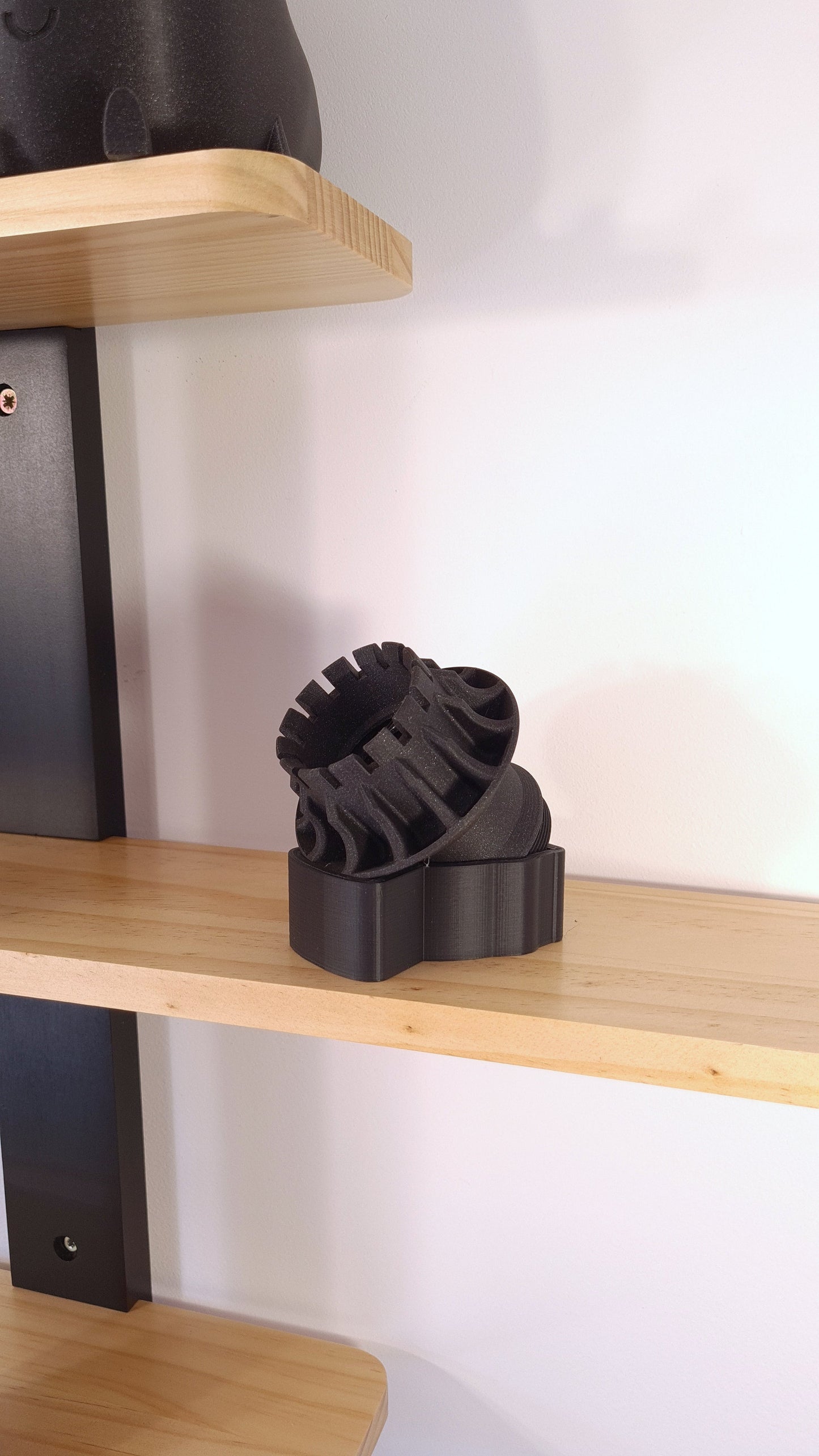 Black 3D printed F1 wheel replica, Formula 1 decor for F1 fans.