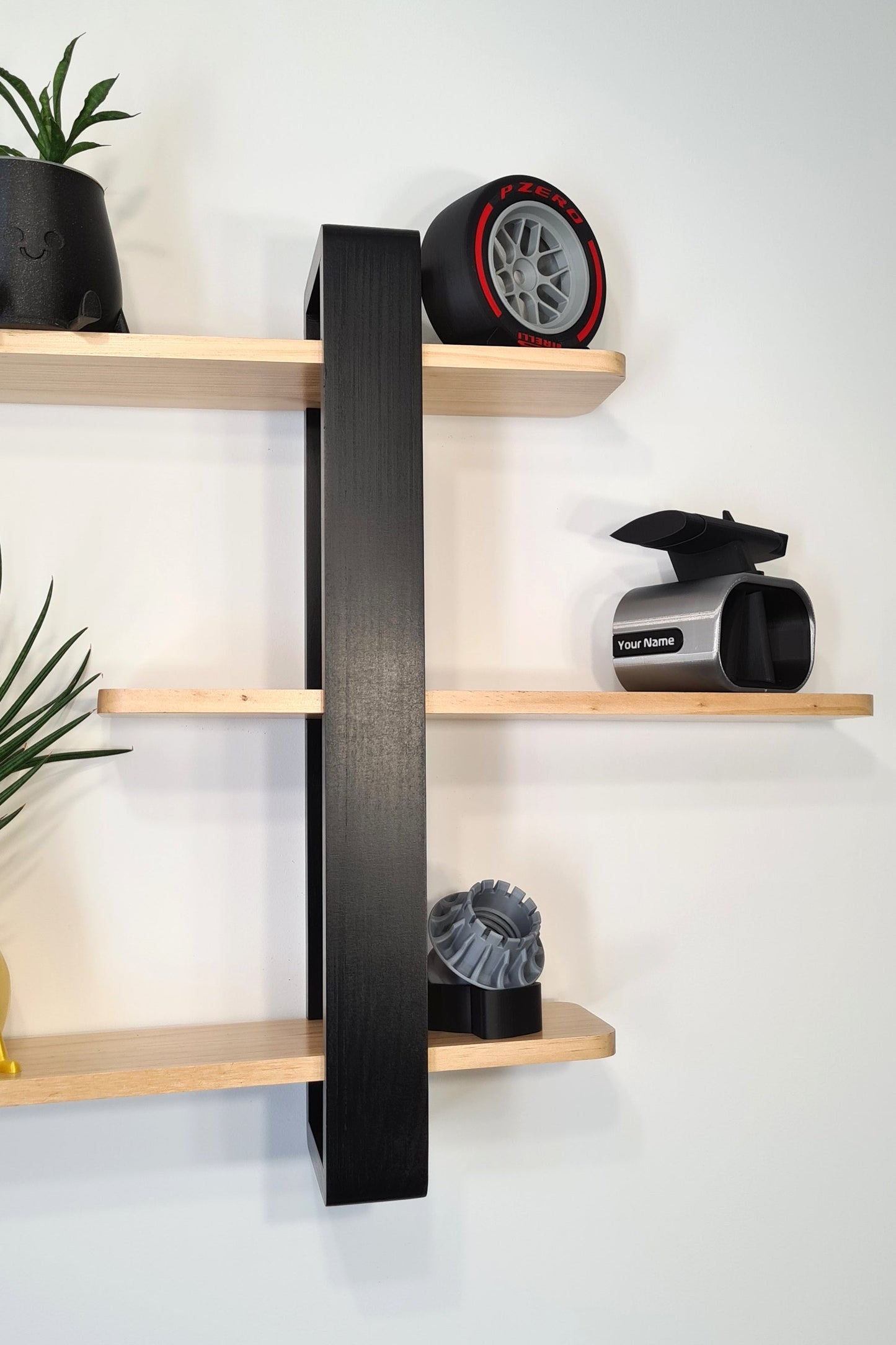 F1 Pirelli P Zero tire replica, customizable front wing, and wheel nut display models for F1 fans.