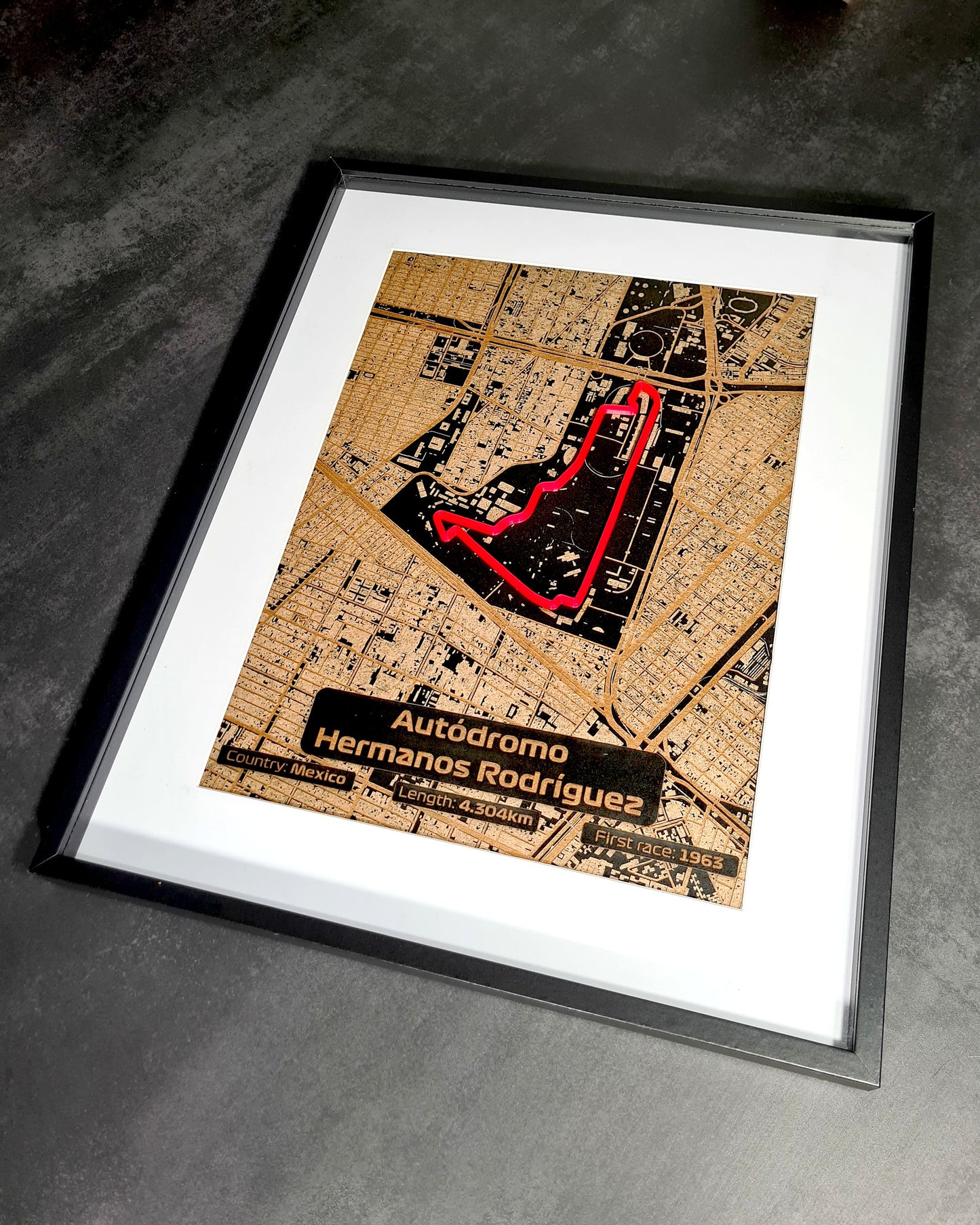"Product image displays a beautifully crafted Mexico Grand Prix track framed art with a laser-cut map, drawing numerous positive customer reviews highlighting its quality, ideal for Formula 1 fans."
