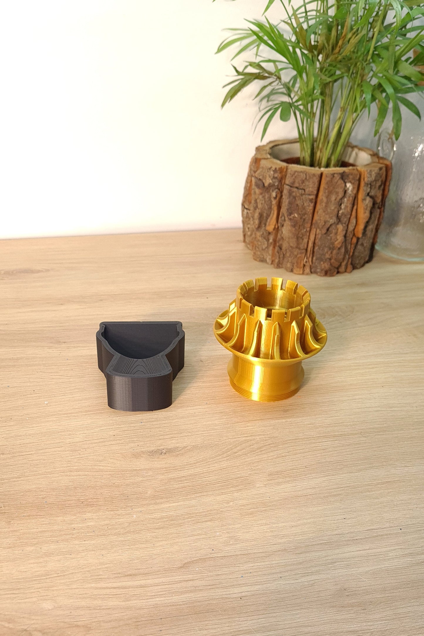 Gold F1 wheel nut replica 3D printed desk ornament with black stand, unique Formula 1 fan gift.
