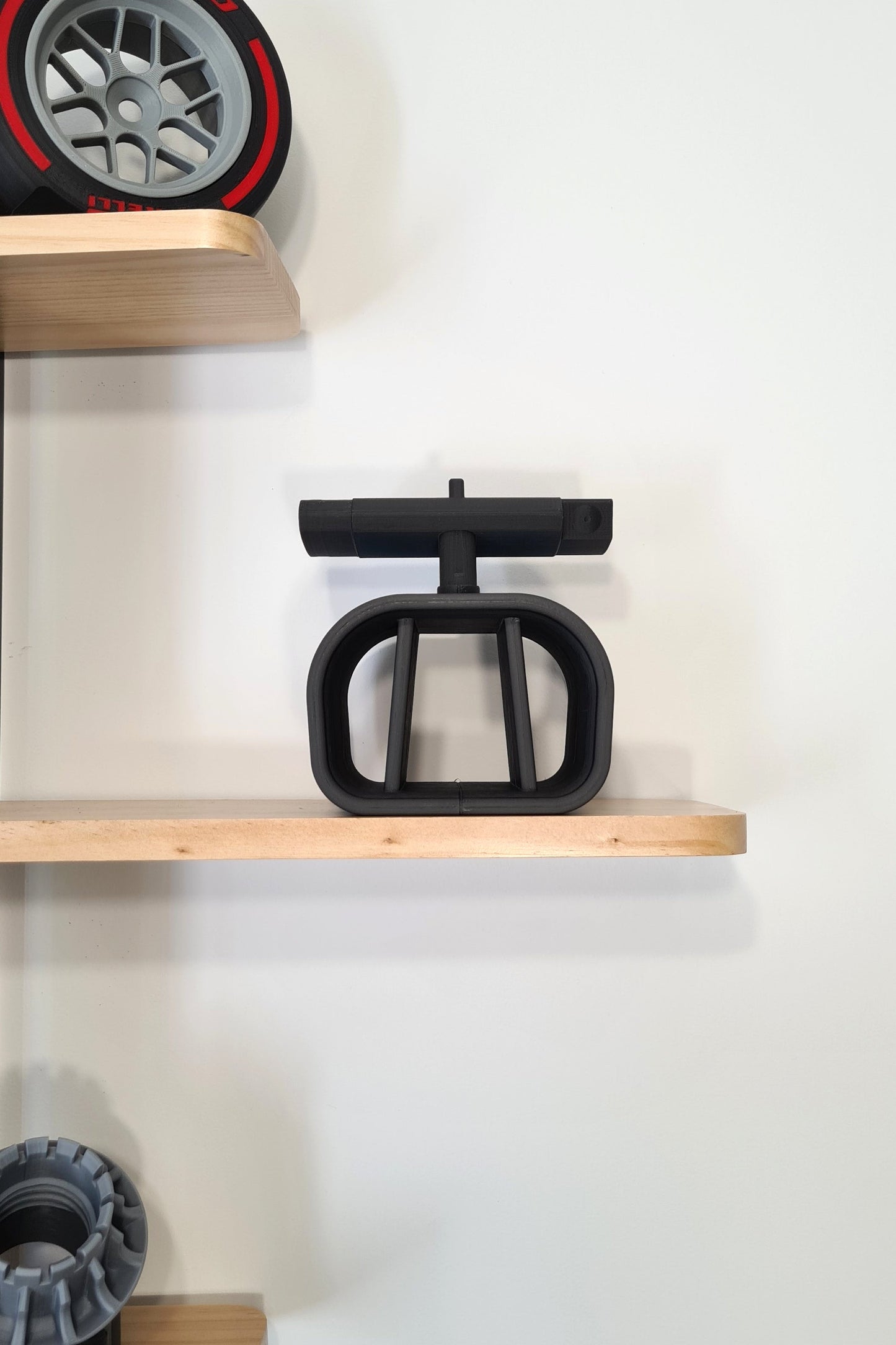 Black 3D printed F1 aerodynamic car part model, unique Formula 1 fan gift.