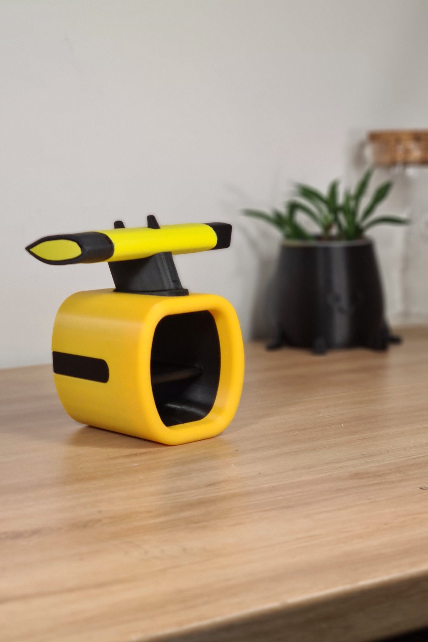 Yellow and black F1-inspired 3D printed desk ornament, sleek motorsport fan decor gift.