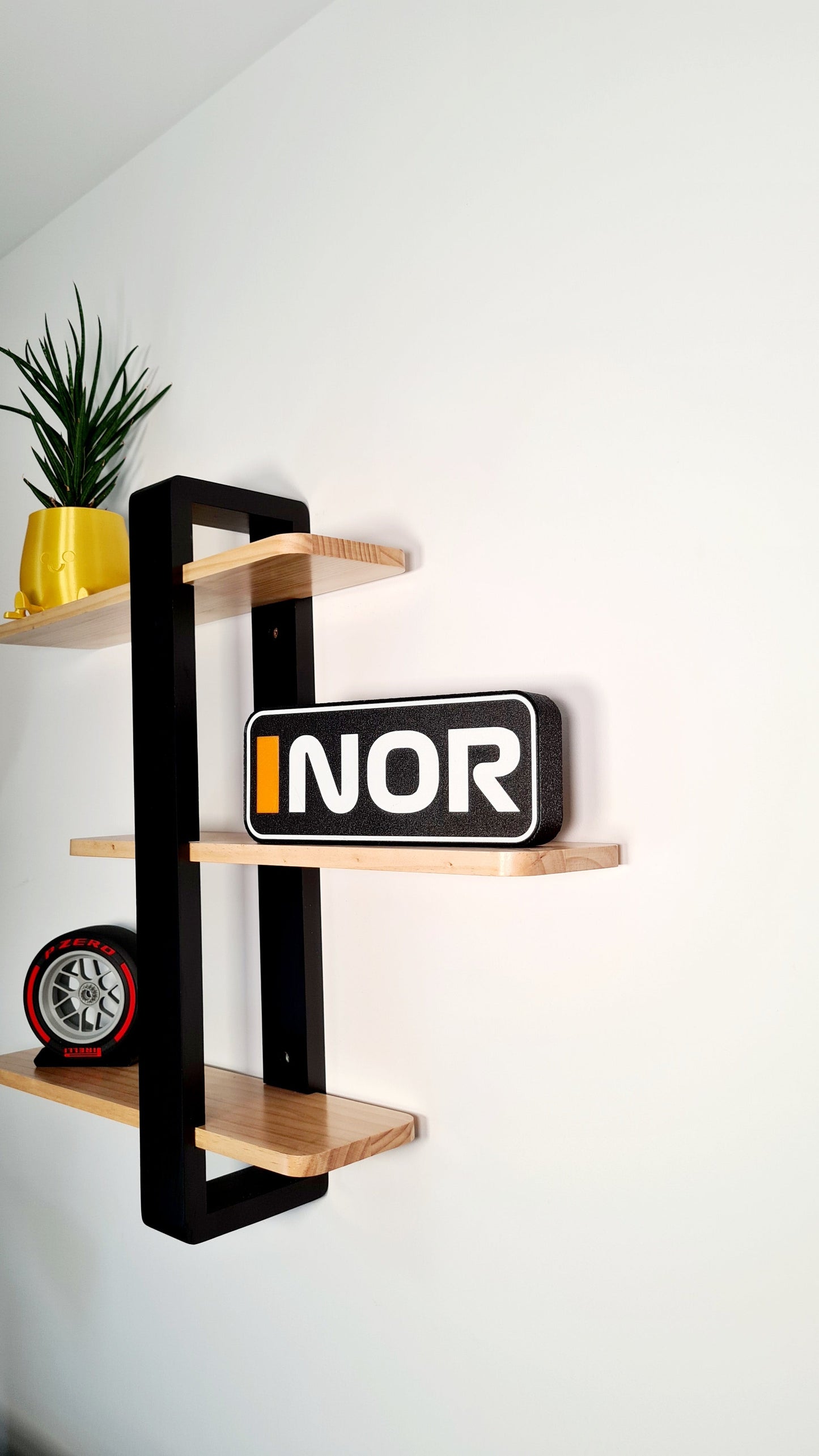 McLaren Lando Norris "NOR" F1 display sign and Pirelli red F1 tire replica, perfect gift for F1 fans.
