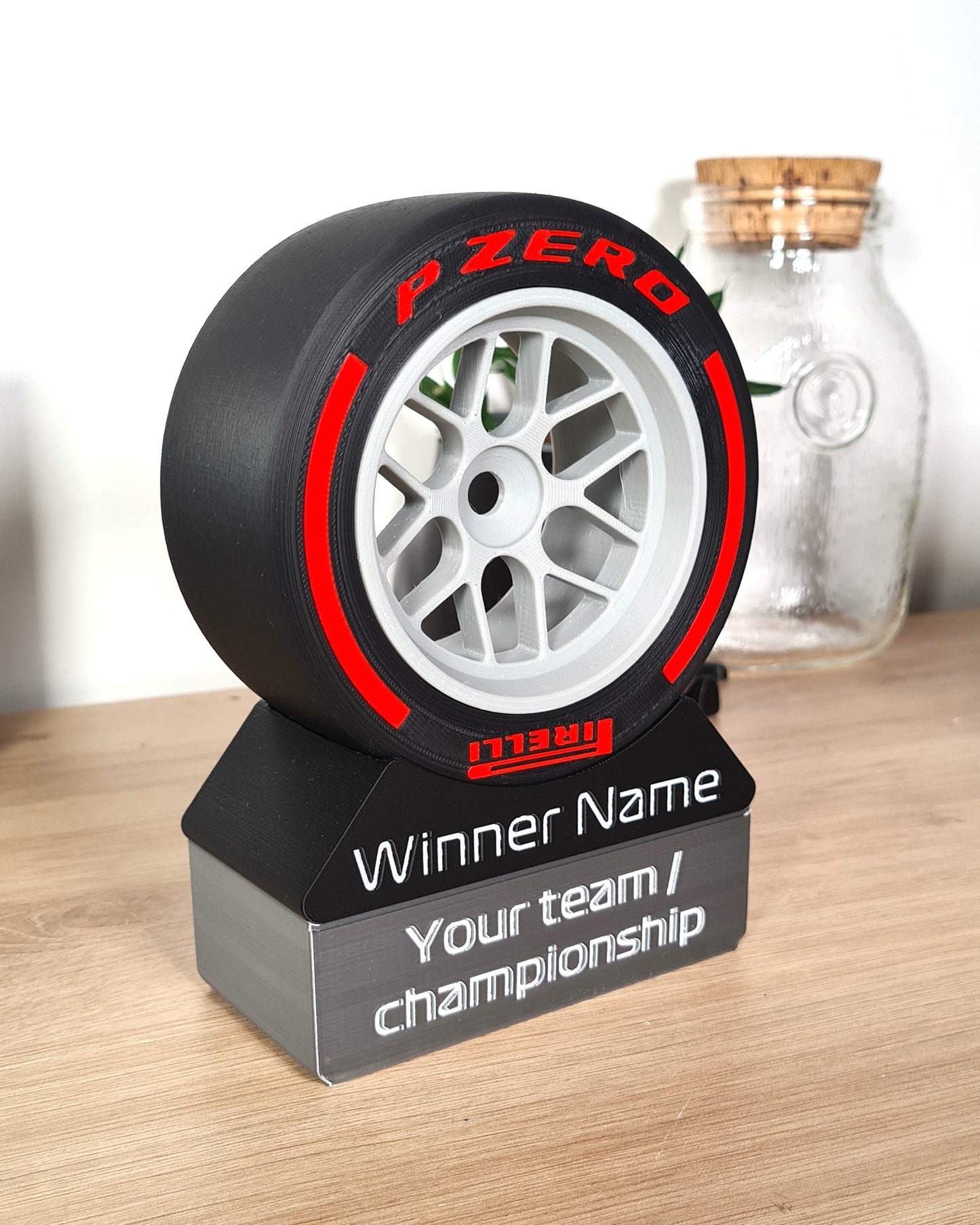 F1 Pirelli P Zero red slick tire wheel replica, customizable winner trophy for motorsport fans.