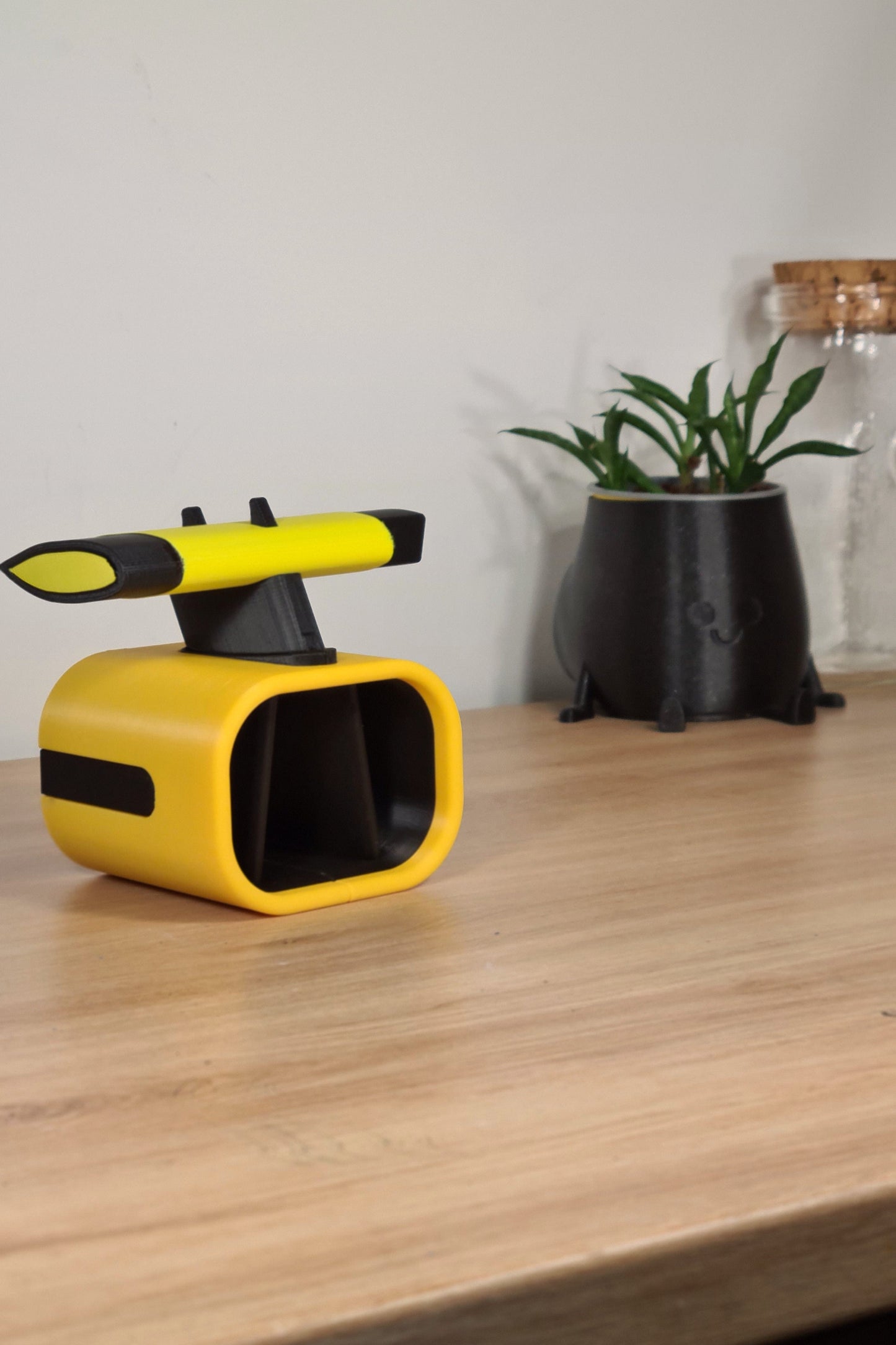 Yellow and black 3D printed Formula 1 rear wing desk organizer, ideal F1 fan gift.