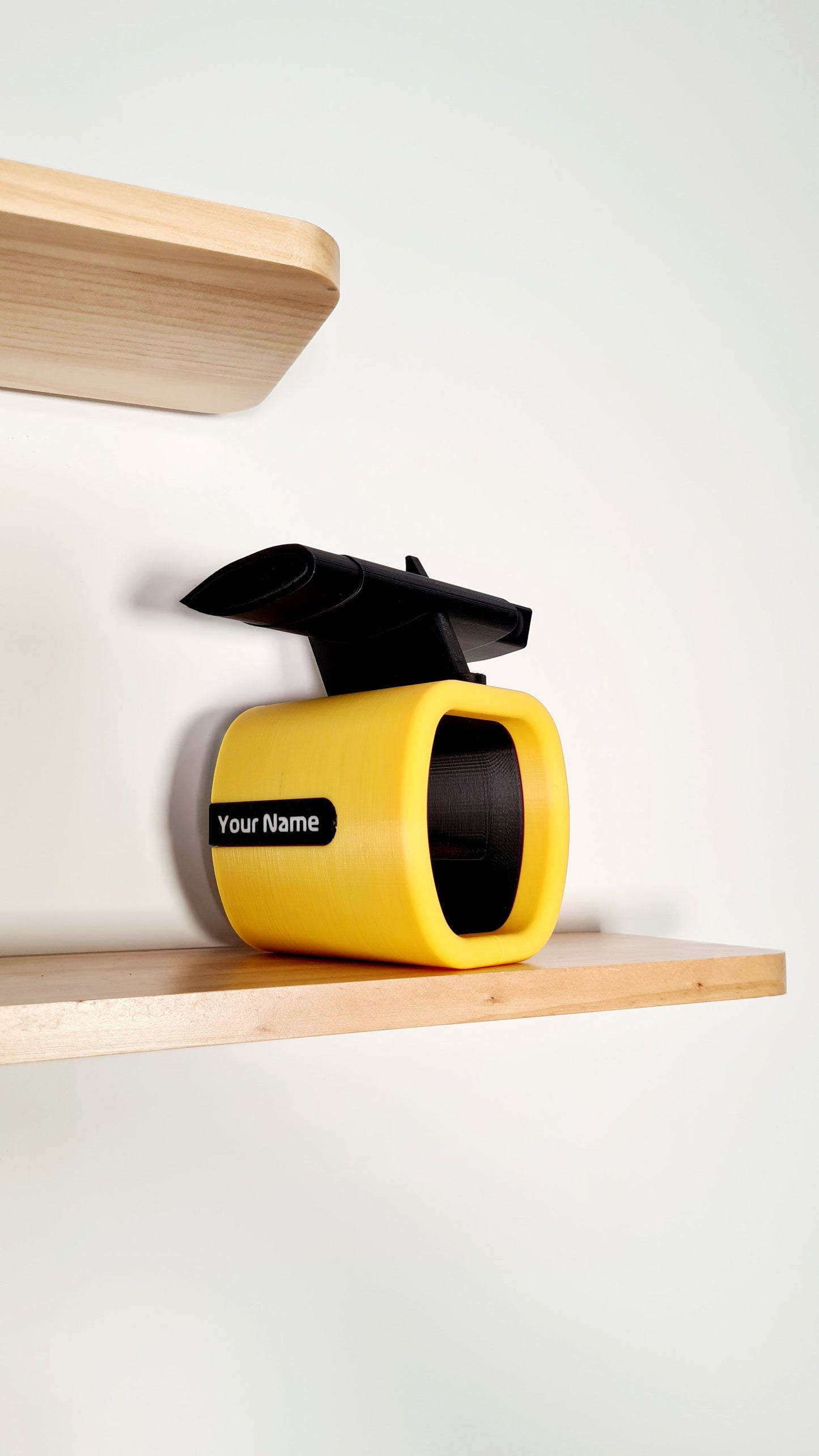 Custom yellow F1 tire replica desk organizer with black rear wing, personalized F1 fan gift.