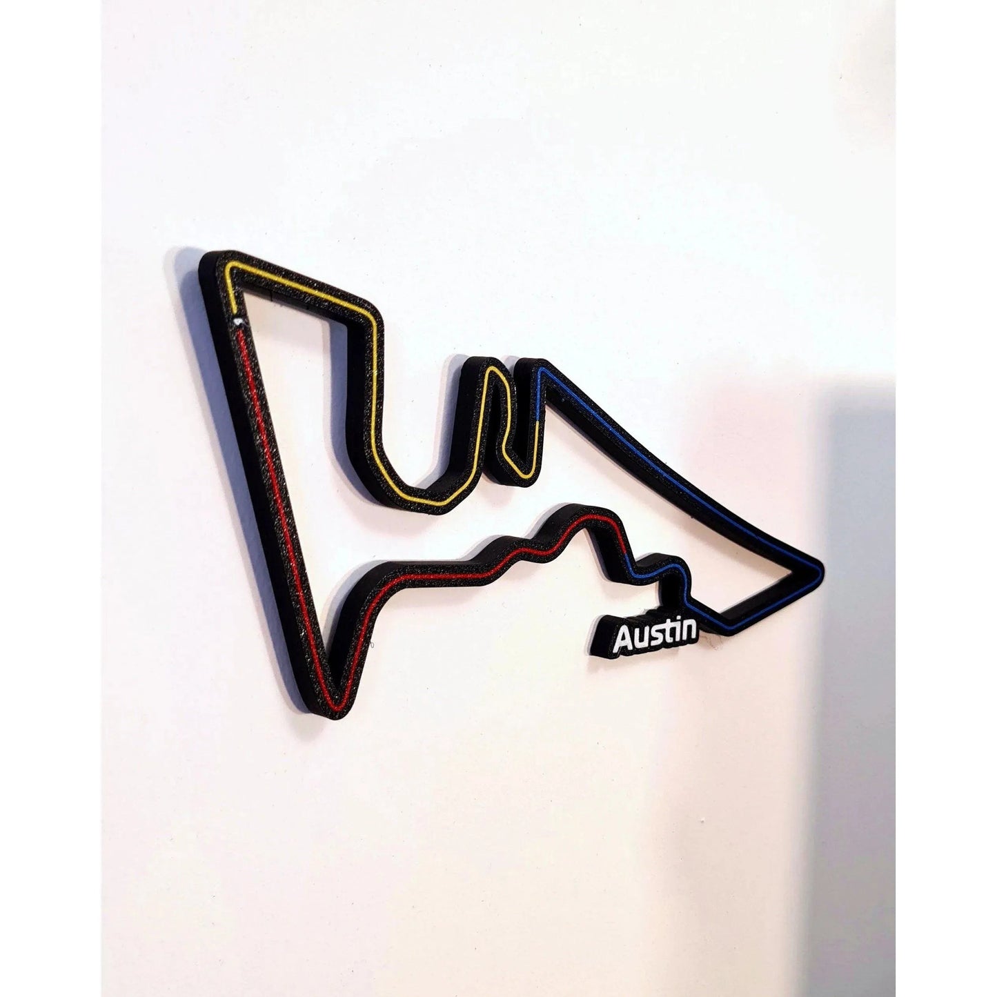 Black 3D F1 Circuit of the Americas (COTA) track wall art with red, yellow, blue lines, unique Austin Grand Prix fan gift.
