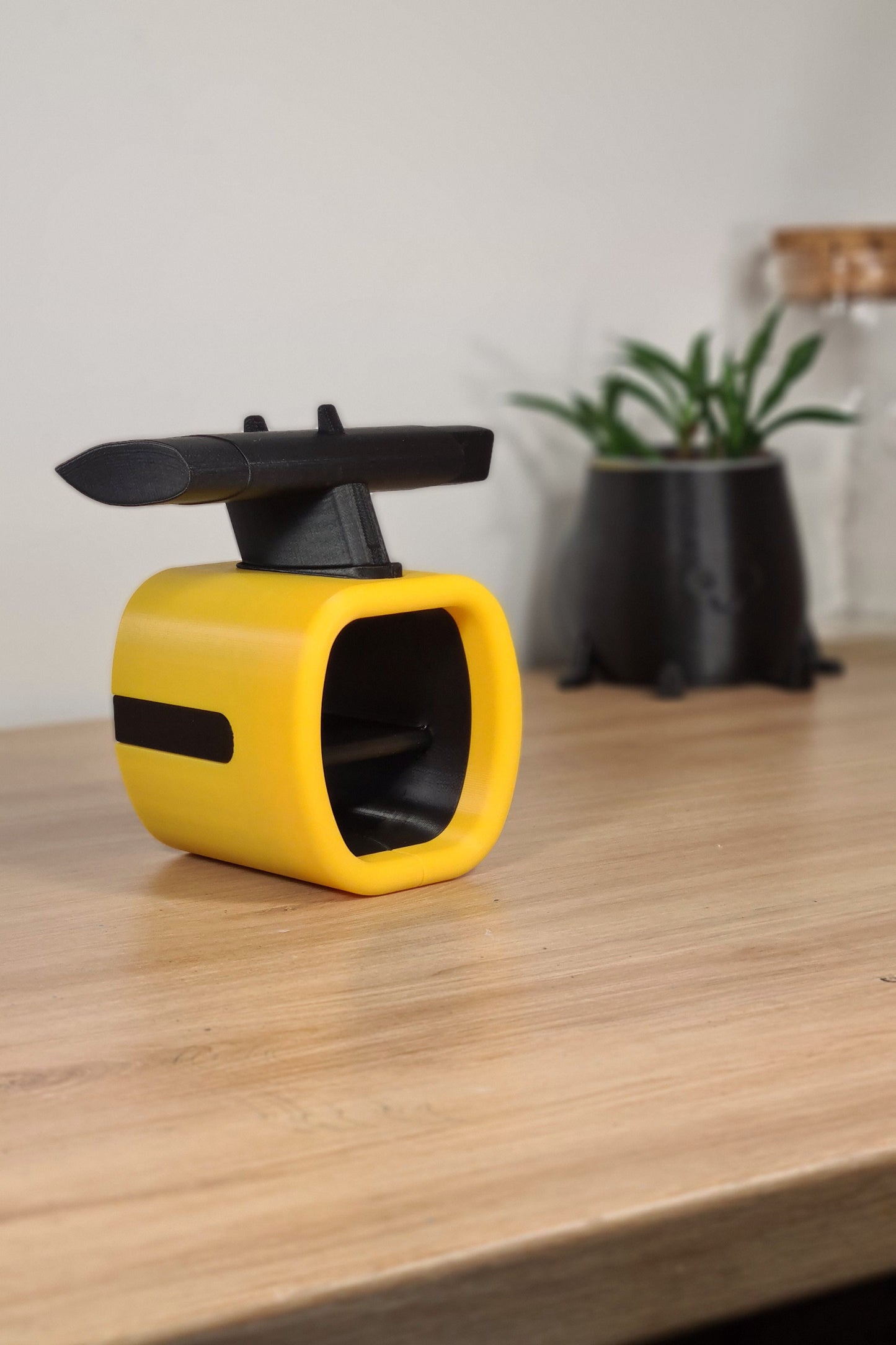 Yellow and black 3D printed F1 car desk decor, ideal motorsport fan gift.