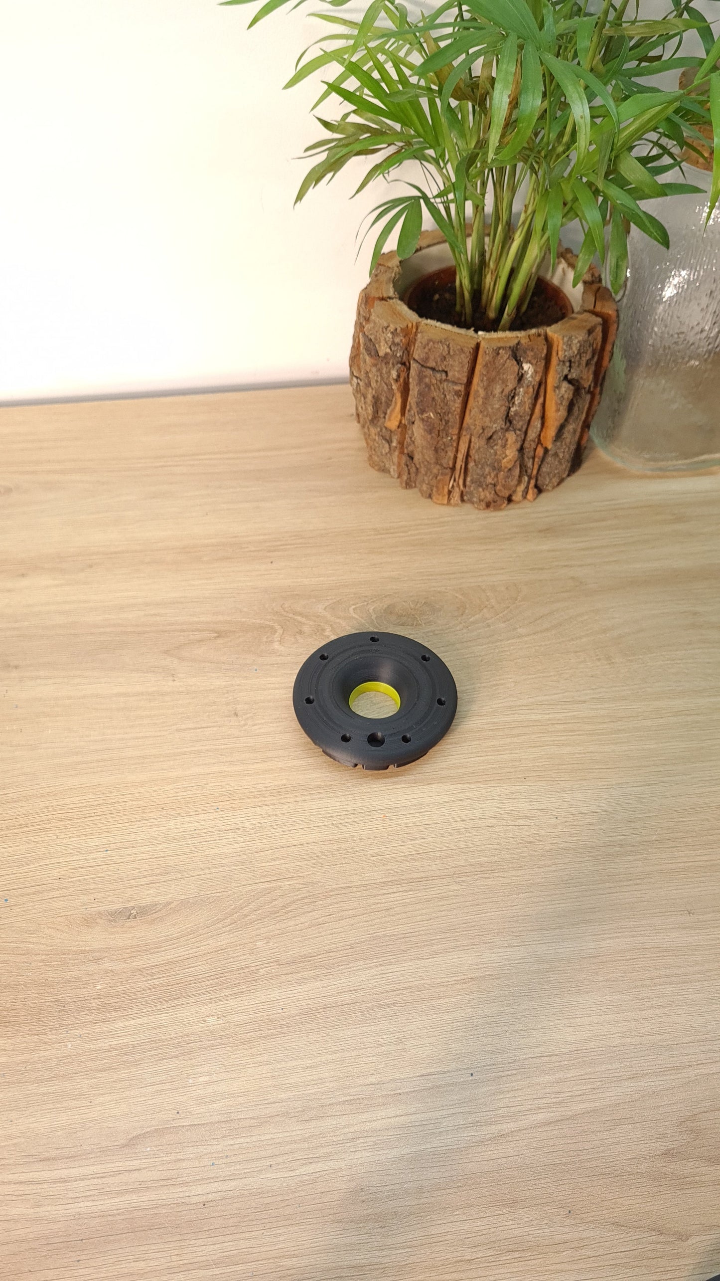 Black F1 wheel centerlock replica with yellow detail, unique Formula 1 fan gift.