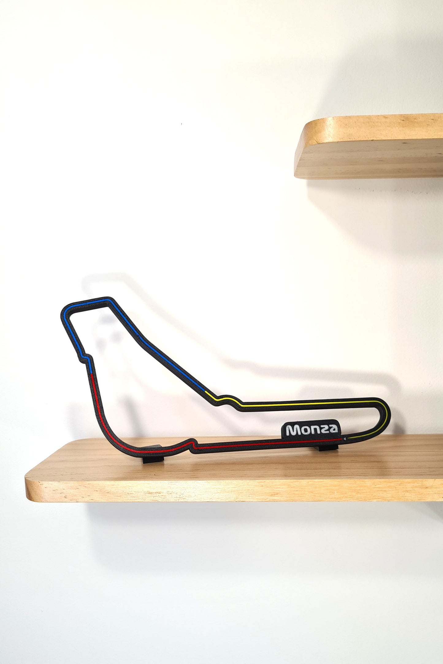 Monza Formula 1 circuit 3D track display, black with iconic red, blue, yellow lines, F1 fan gift.