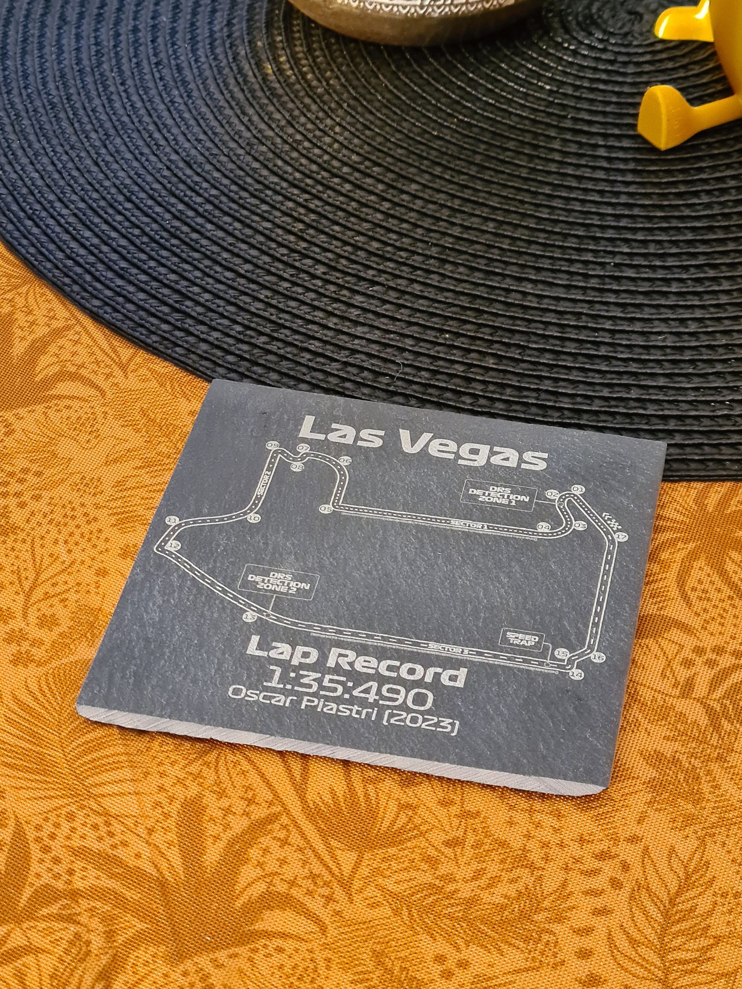 Las Vegas Formula 1 circuit slate coaster featuring Oscar Piastri's 2023 lap record, perfect F1 fan gift.