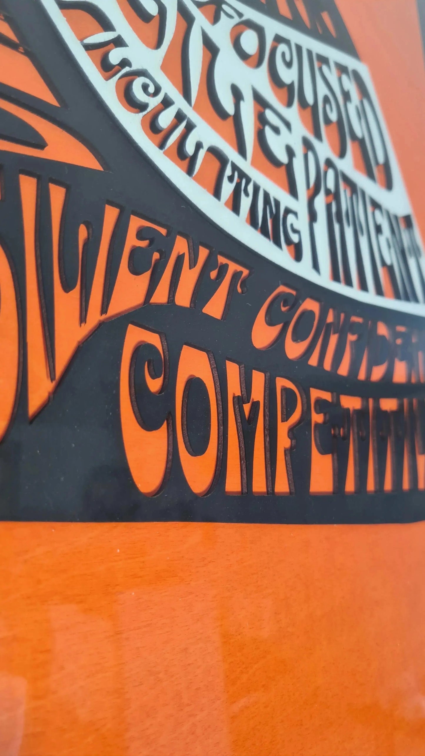 Orange and black 3D layered F1 motivational wall art, ideal for racing fan man cave decor.