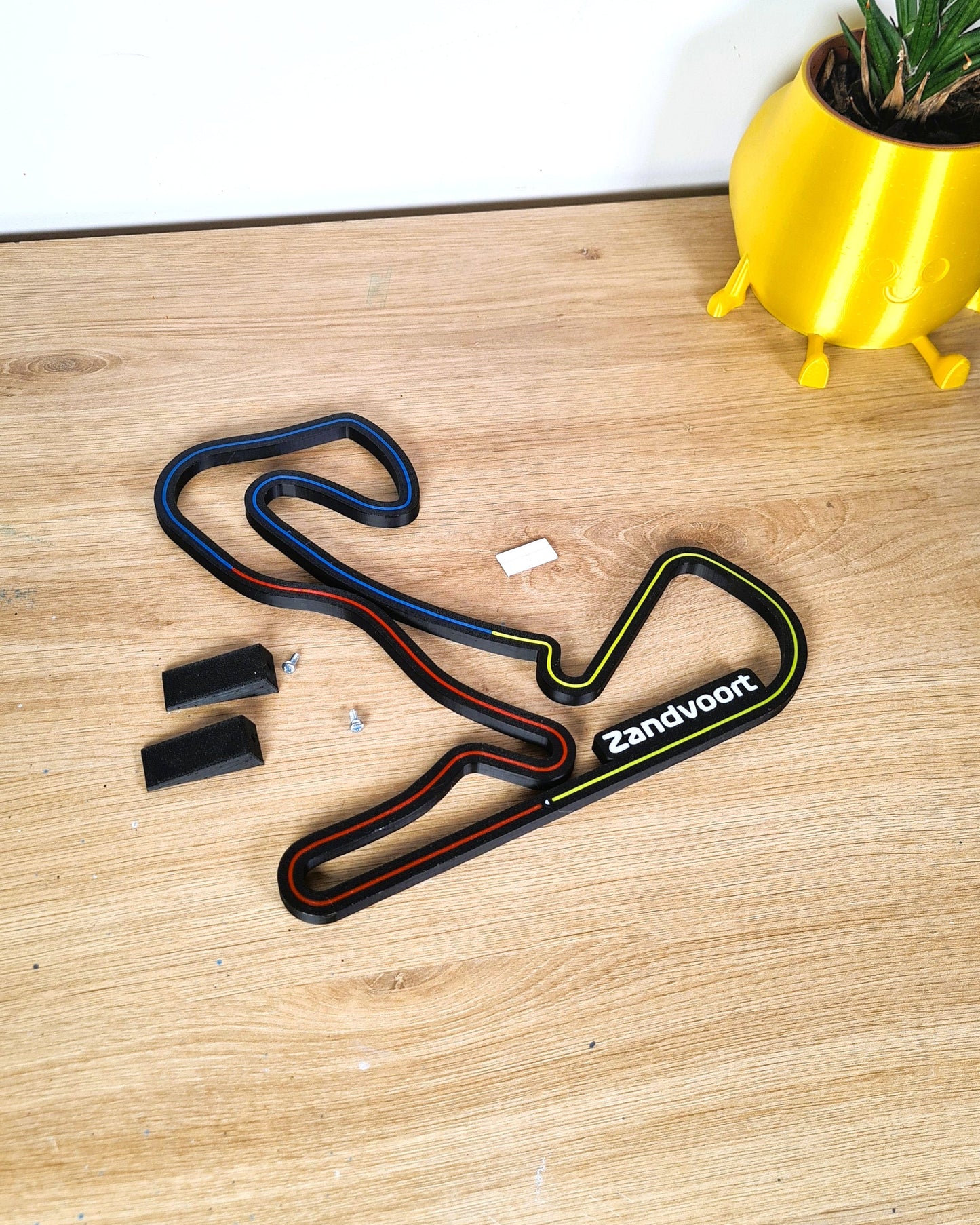 Black 3D printed Zandvoort Formula 1 circuit track model with colored lines, ideal F1 fan gift.