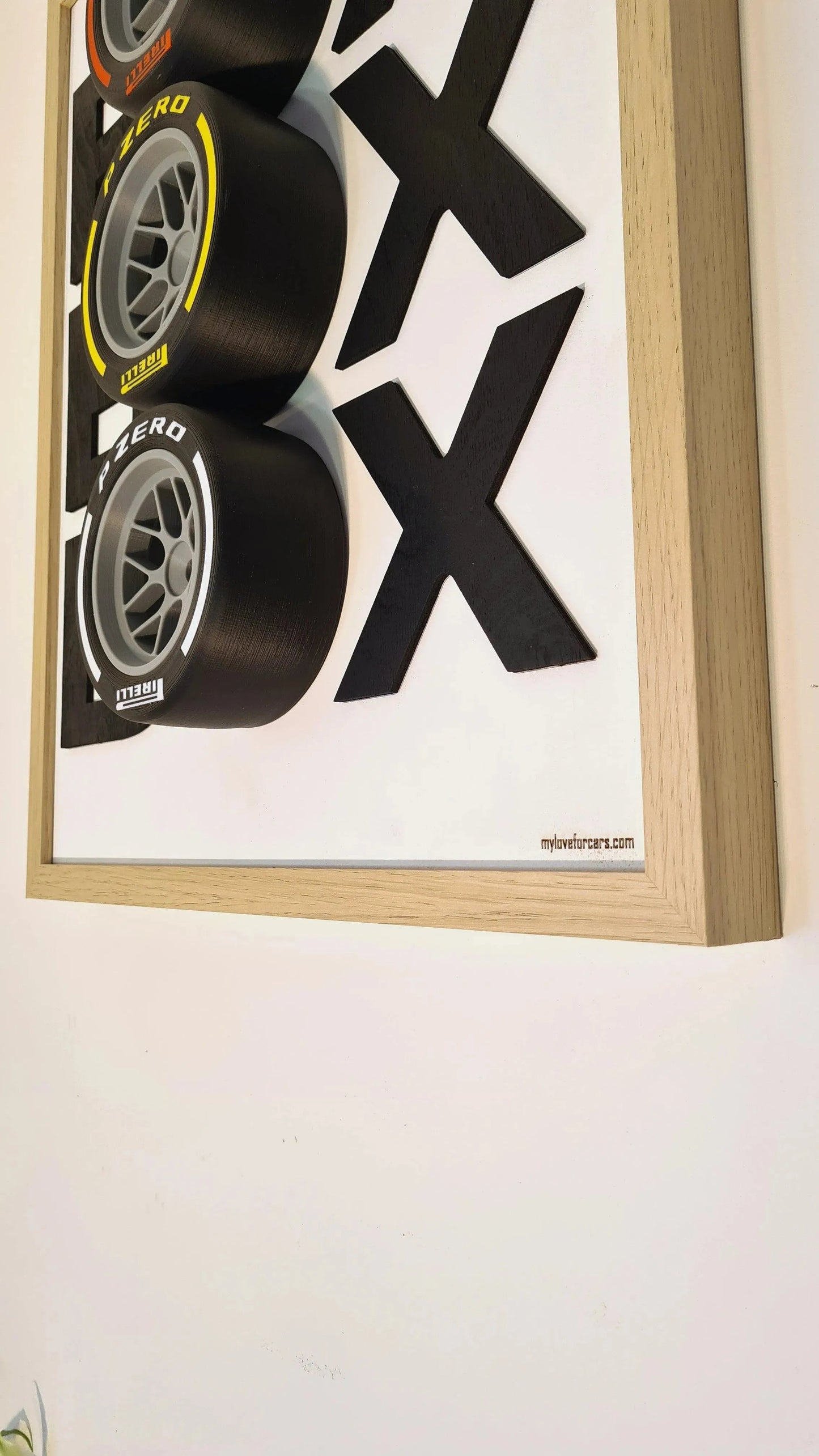 3D F1 Pirelli P Zero yellow, white, orange tire replica Tic-Tac-Toe framed art for F1 fans.