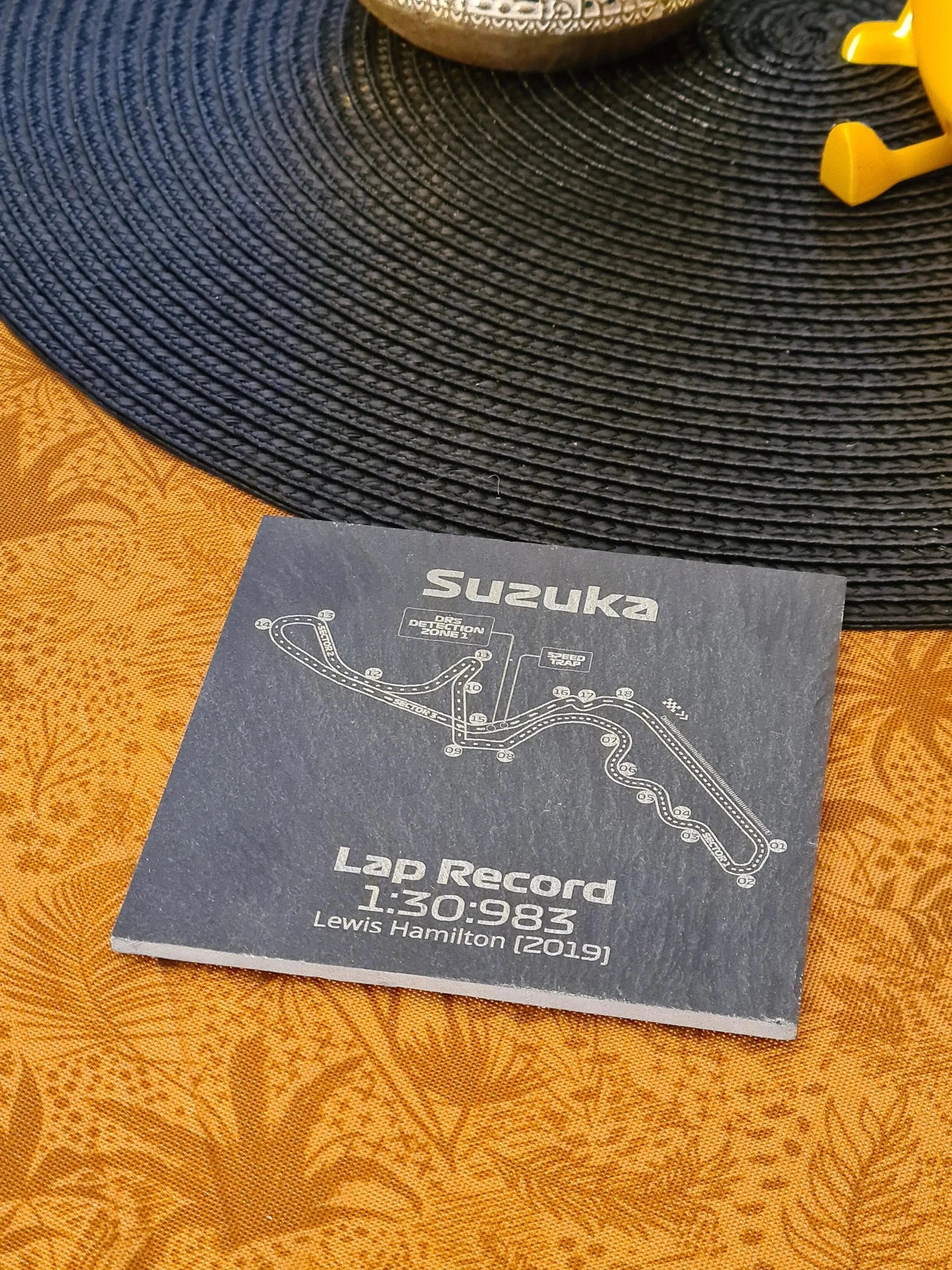 Suzuka Circuit F1 slate coaster with Lewis Hamilton lap record, unique Formula 1 fan gift.