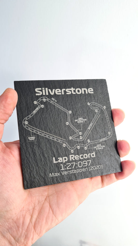 Engraved Silverstone F1 circuit track map slate coaster with Max Verstappen's 2020 lap record, unique F1 fan decor.