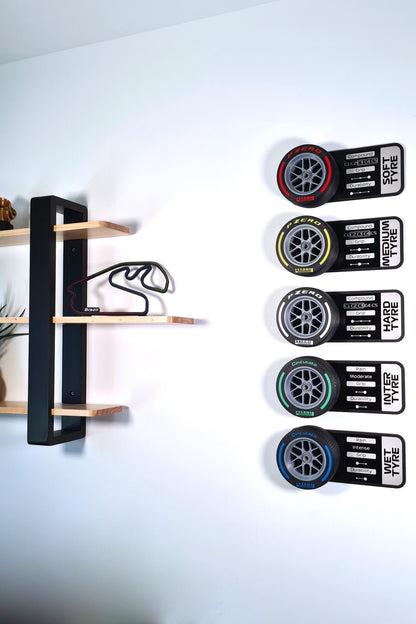 F1 Pirelli tire compound wall art set (Soft, Medium, Hard, Intermediate, Wet) with a 3D Brazil circuit model.