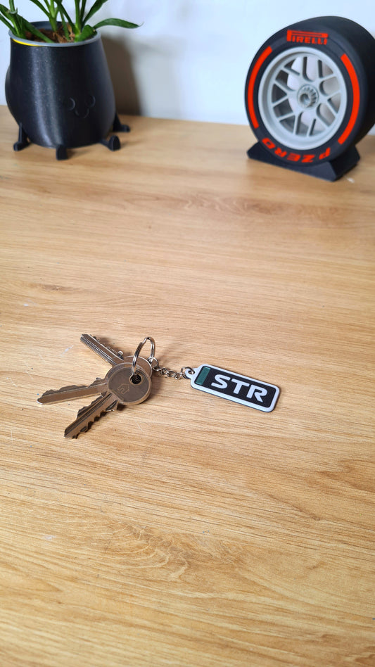 Porte-clés Aston Martin F1 personnalisable avec noms à 3 lettres - Alonso &amp; Stroll