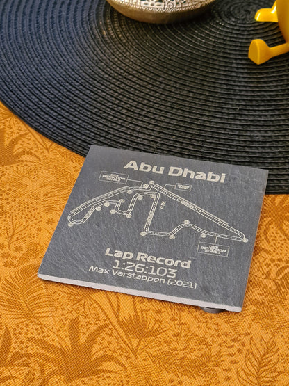 Abu Dhabi F1 circuit map slate coaster with Max Verstappen 2021 lap record, unique Formula 1 fan gift.