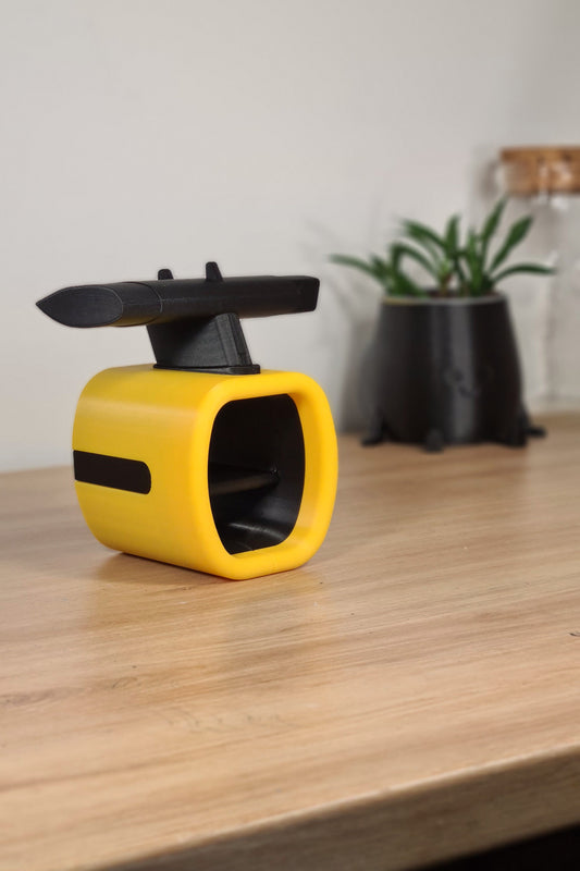 Yellow and black 3D printed F1 car desk decor, ideal motorsport fan gift.