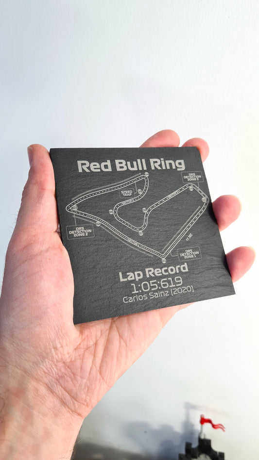 Red Bull Ring Formula 1 track map slate coaster with Carlos Sainz 2020 lap record, perfect F1 fan gift.