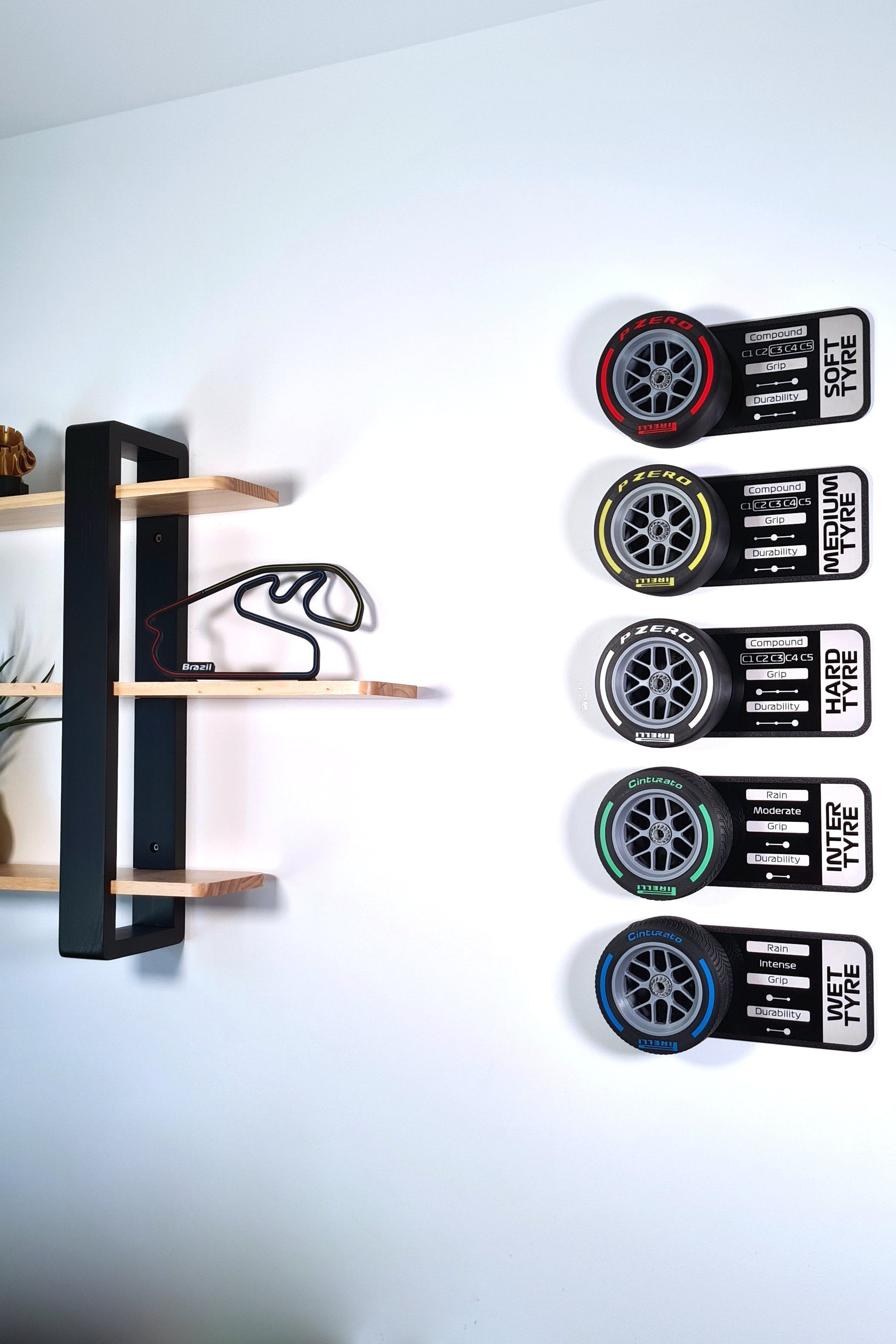 Brazil F1 track 3D wall art and F1 Pirelli tire compound replica display set, perfect motorsport fan decor.