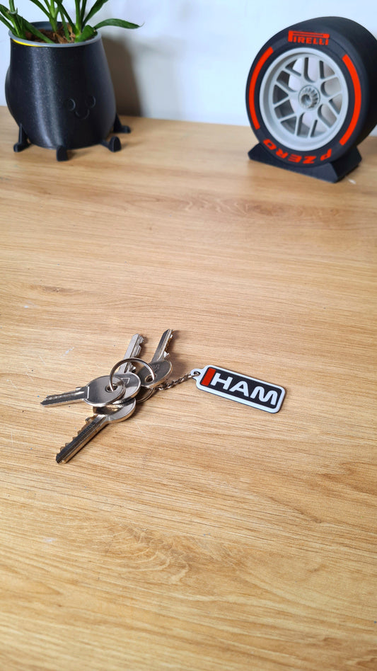 Lewis Hamilton HAM F1 driver initials keychain, perfect motorsport fan gift.