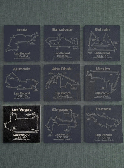 Set of 9 F1 track map slate coasters with lap records for various Grand Prix circuits, ideal F1 fan gift.