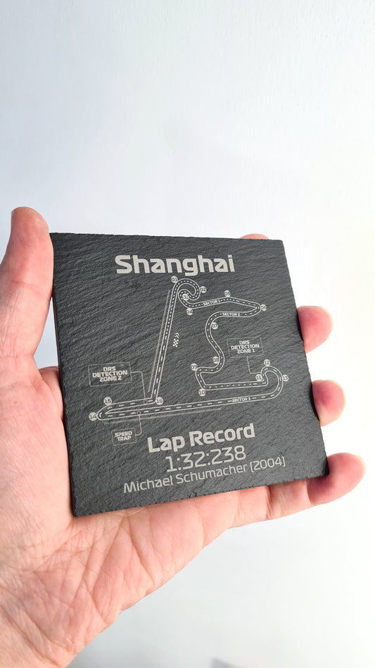 Shanghai F1 circuit map slate coaster with Michael Schumacher's 2004 lap record, unique F1 fan gift.