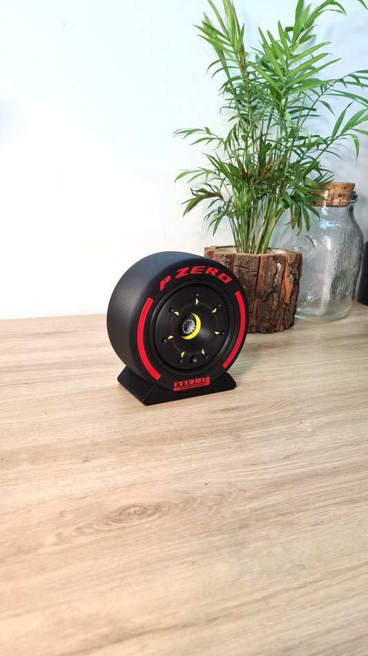 3D printed Pirelli P Zero F1 tire replica with red soft compound, ideal Formula 1 fan desktop decor.